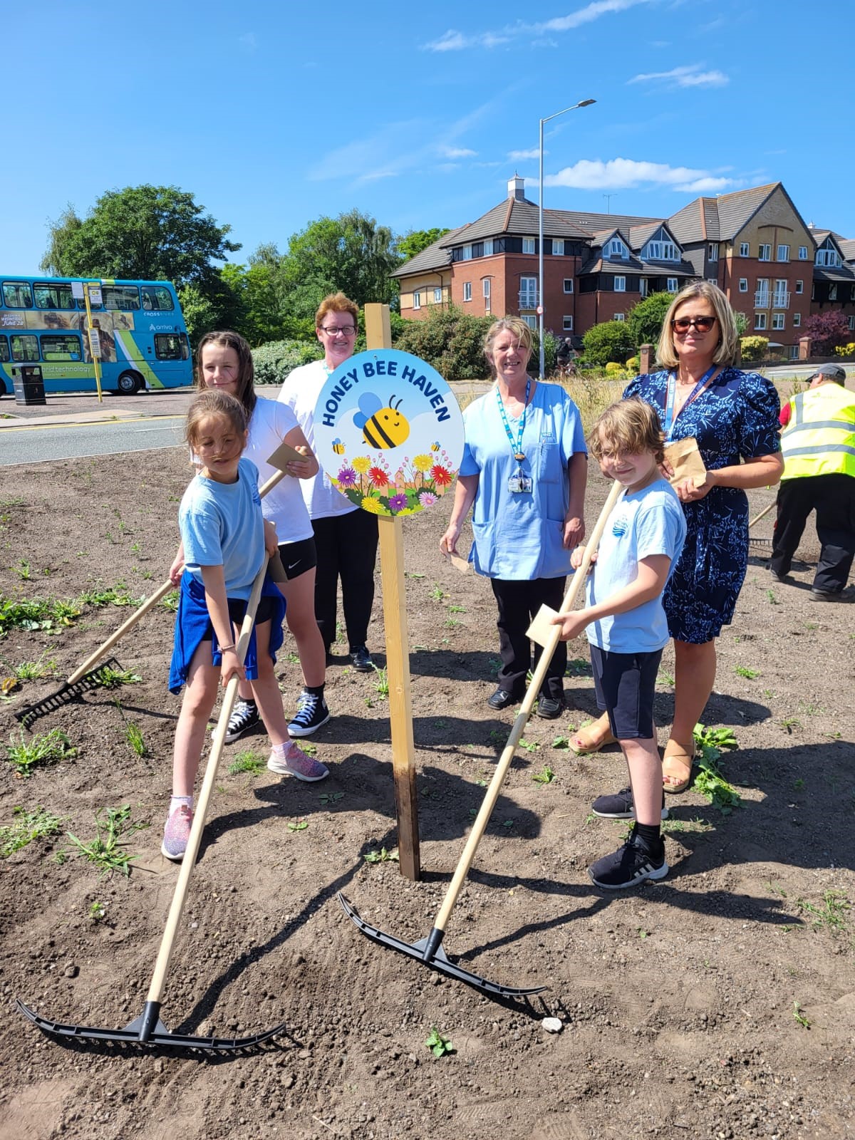 Children from local primary school sowing seeds in West Kirby