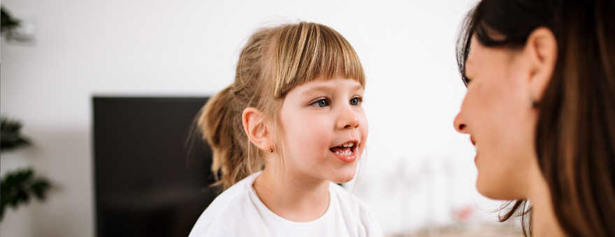 Child looking at her mum. 