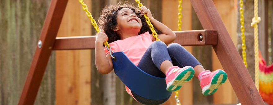 Child on a swing.