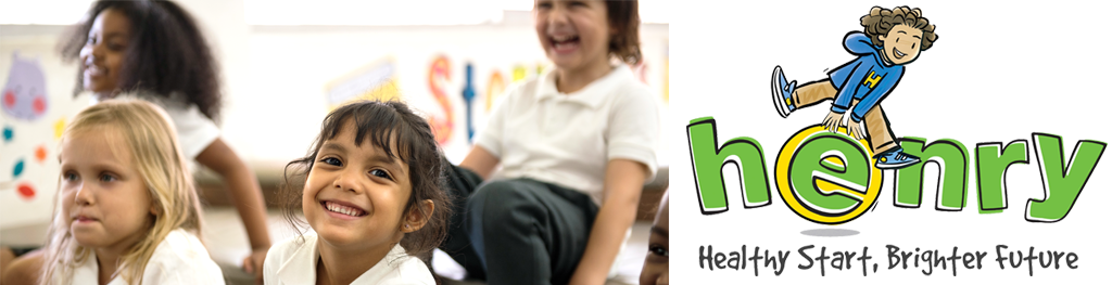 Photograph of school children smiling. 
Image of the HENRY logo.
