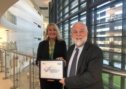 CEO Karen Howell and Chair Michael Brown presented with Veteran Aware Certificate at St Caths Health Centre