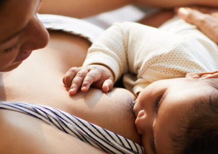 Woman breastfeeding baby
