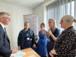 Sir Julian Hartley talking to community nurses