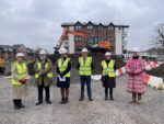 Group of people at press event at Marine Lake