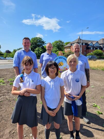 Children from local primary school sowing seeds in West Kirby