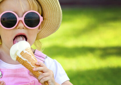 Young child eating ice cream